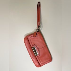 Coral leather Coach wristlet